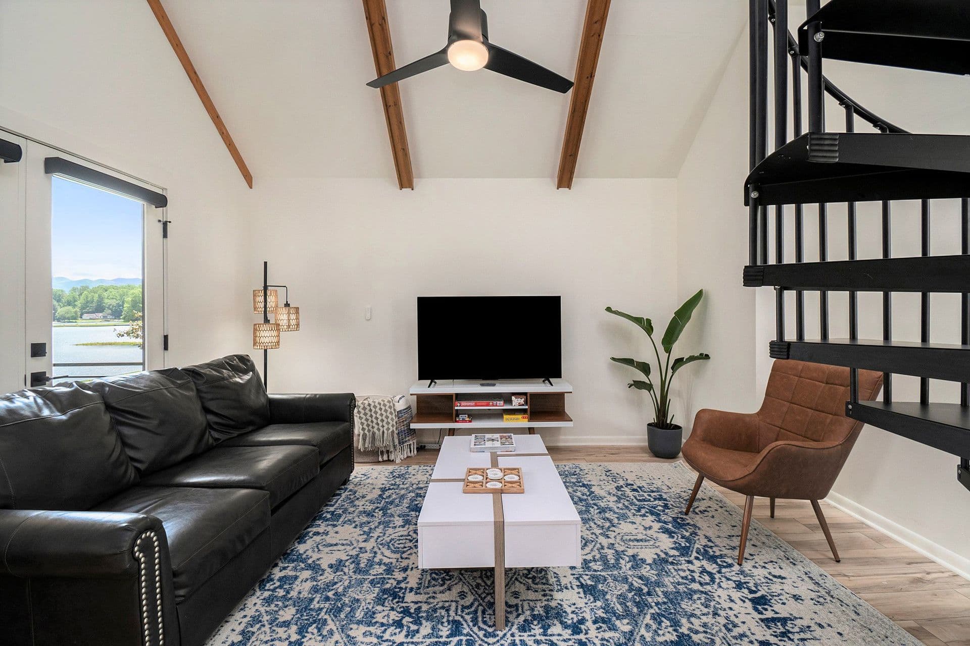 Blue Cabin cozy living room with fireplace at Tranquille Resort
