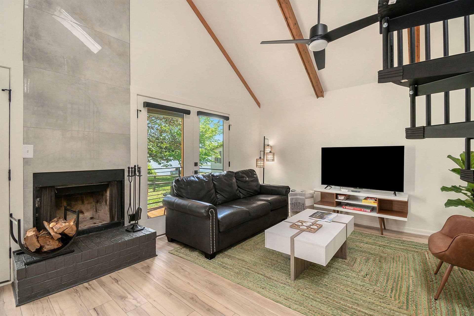 Wood-burning fireplace in Green Cabin at Tranquille Resort