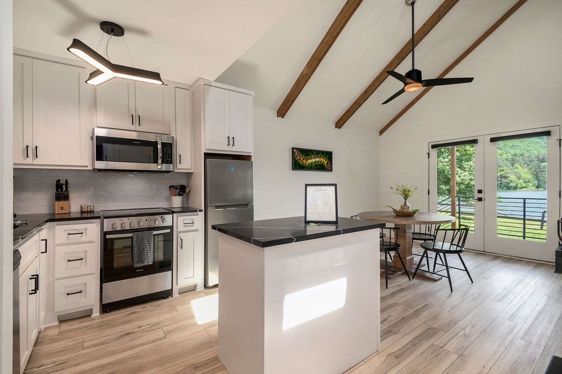 Full kitchen with modern appliances in White Cabin at Tranquille Resort