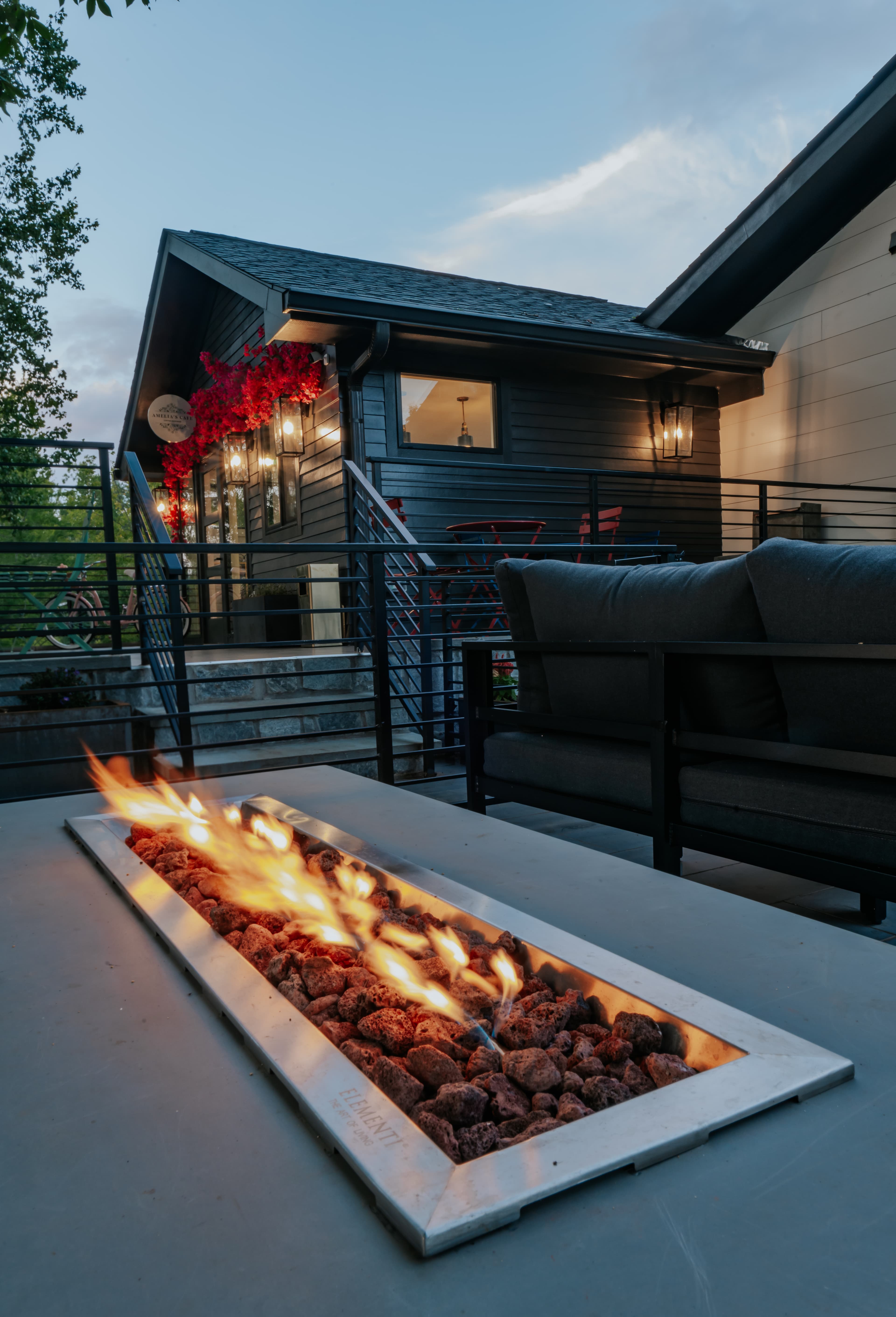 Outdoor fire table on the patio at Tranquille Resort Hiawassee GA — gathering space for family reunions on Lake Chatuge