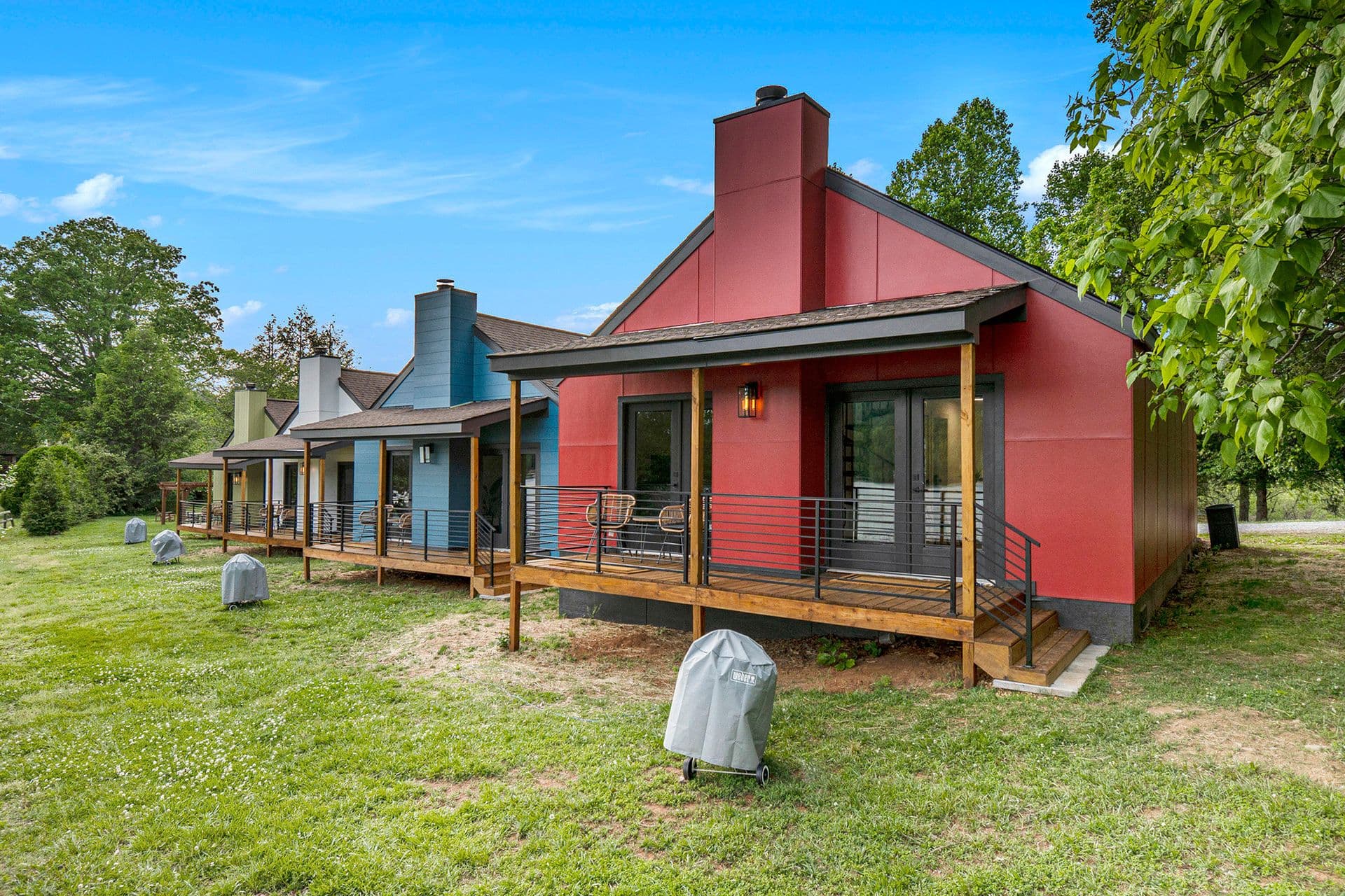 Lakeside cabin porches with rocking chairs overlooking Lake Chatuge at Tranquille Resort